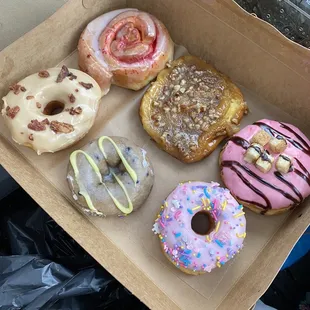 Rosette (my favorite), Sticky bun, Cherry Cheesecake, maple bacon, Blueberry cake with lemon drizzle, unicorn sprinkle.