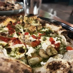 Capizzi: Mozzarella / Ricotta / Roasted Red Peppers / Roasted Garlic