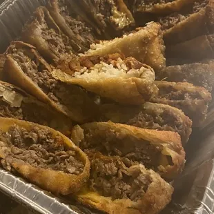 This is a platter of cheesesteak egg rolls!