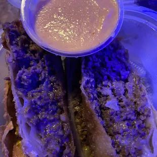 Cheesesteak egg roll with spicy cheese sauce