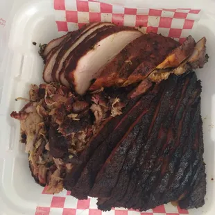 1 .lb sliced brisket, 1/2 .lb chicken, 1/2 lb. pulled pork