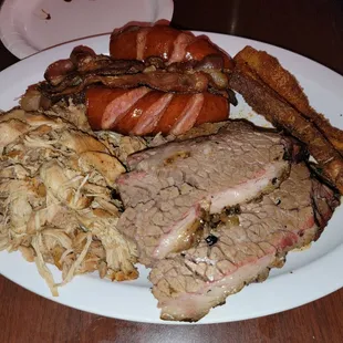 Legit Food Baby combo (brisket, pulled pork, pulled chicken, pork belly, smoked meatloaf, smoked sausage, and bacon)