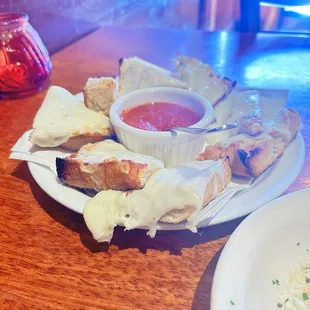 I love how the melted cheese is dripping over the side.