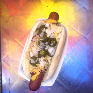 a hot dog with toppings