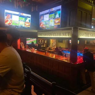 people sitting at the bar