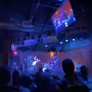 a band performing on stage