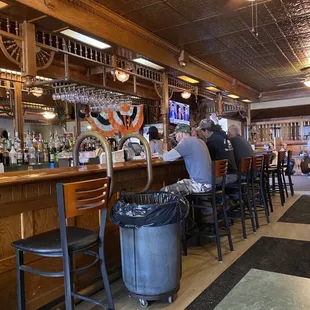 people sitting at a bar