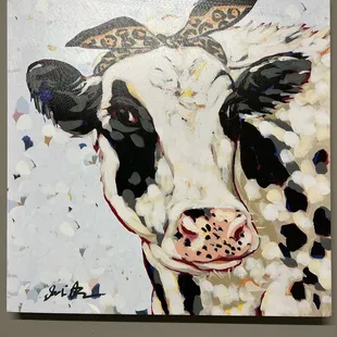 Great Cow art in the restroom.