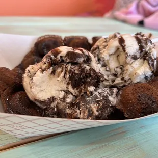 Double chocolate   bubble waffle with moose tracks and chocolate sauce.