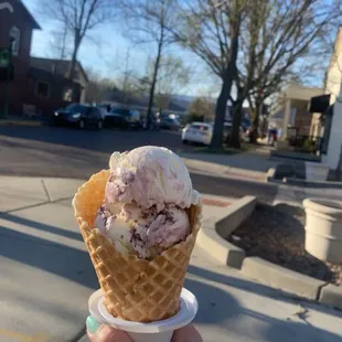 Raspberry cheesecake double scoop in waffle cones. So so so so so so good.