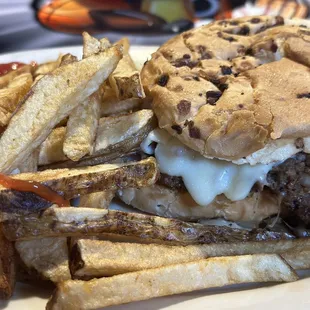 The Scoreboard Deluxe sandwich with fries.