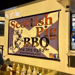 a man standing in front of a food truck