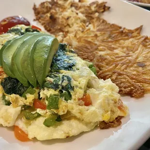 Veggie Omelette with Hash Browns.