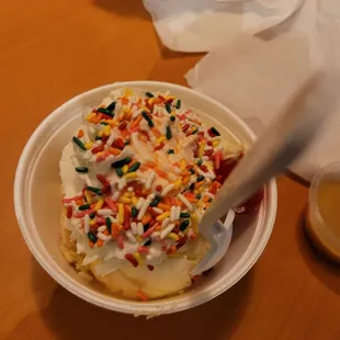 a paper plate with sprinkles