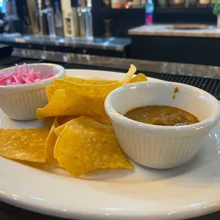 Complimentary chips and sauce