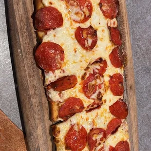 Pepperoni and cheese flatbread.