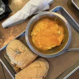 Hot honey Fried chicken poboy and cheese grits