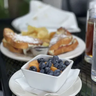Fresh Fruit, Monte Cristo Sandwich and kettle cooked potato chips.