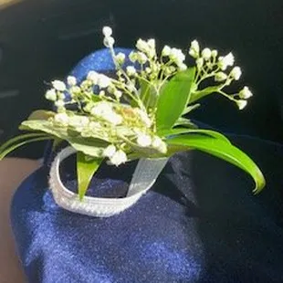 Tiny elastic band and broken corsage
