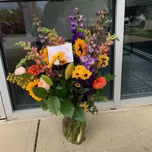 The arrangement delivered was lovely and practically dead on the photo on website.