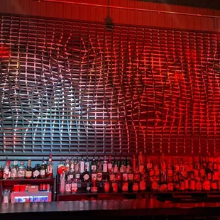 a bar with red lighting