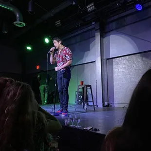 a man speaking into a microphone