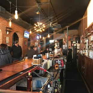 people at the bar of a restaurant