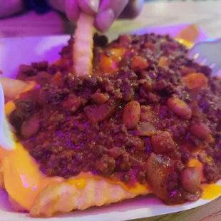 a plate of chili fries