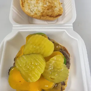 a burger and pickles