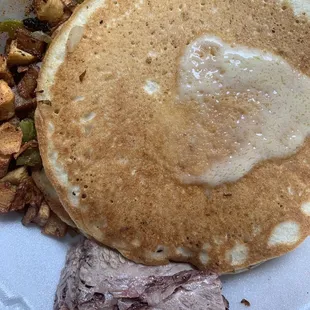 Breakfast platter: choose a meat and two sides. I chose brisket, potatoes, and pancakes.