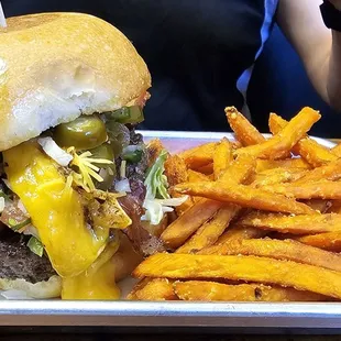 Mexican burger with sweet potatoe fries.