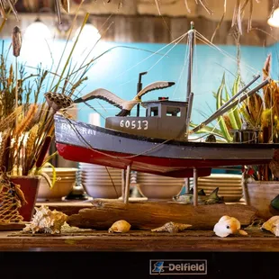 a model of a fishing boat on display