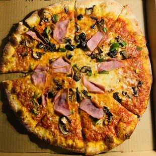 Create Your Own: ham, black olives, mushrooms and jalapeños