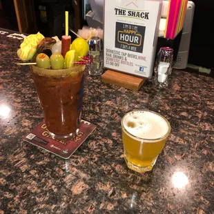 An awesome big bloody! The Shack is known for that. On the right is a chaser of Spotted Cow.