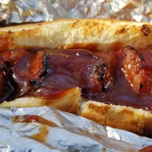 Kielbasa, "John's Way", his special BBQ-ish sweet-ish sauce. Yummy!