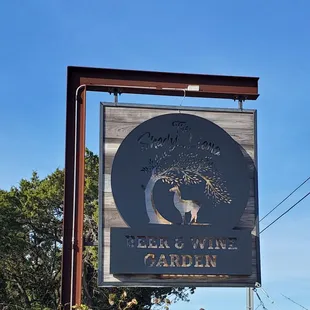 a sign for the tea and wine garden