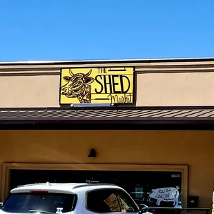 a car parked in front of the store