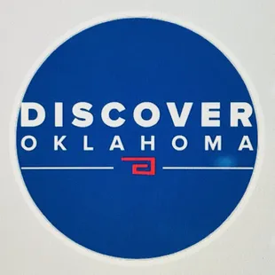 a blue circle with the word discover oklahoma on it
