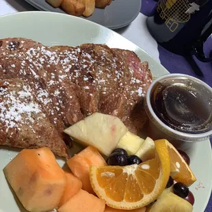 Pecan cranberry French toast with home fries.