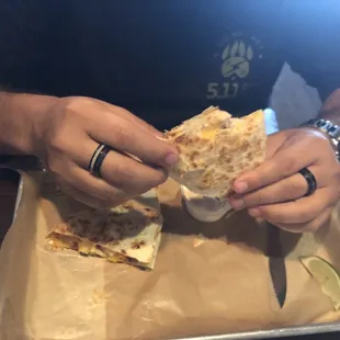 a man eating a sandwich