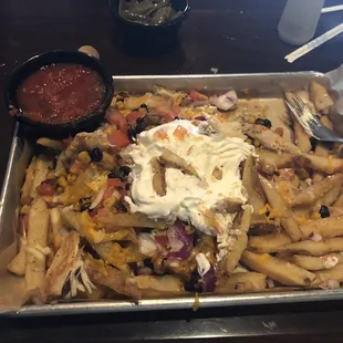 a tray of loaded fries