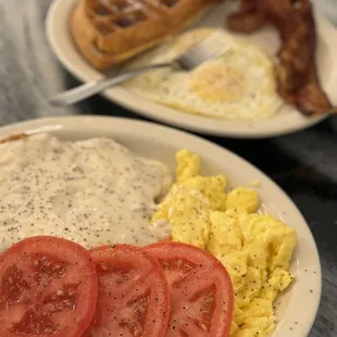 two plates of breakfast food