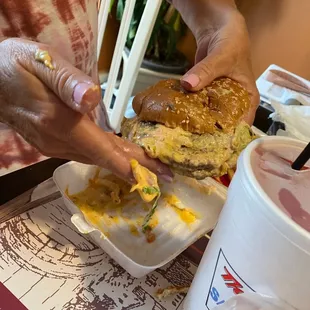 a person eating a sandwich