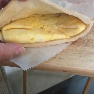 This was supposed to be bacon egg and cheese on a pita, but it's just eggs. Another let down.