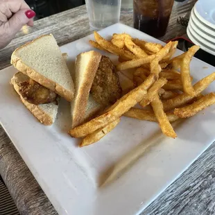 Oyster sandwich before she tried to pick it up and all of the nasty green goo came out.
