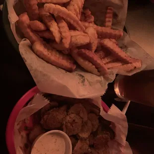 The over-salted fried pickle chips and over-seasoned fries, both of which were more than half thrown out.