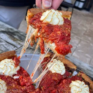  a slice of deep dish pizza