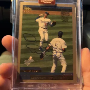 This card was 8.00 and was held and sighed by the player Devon white