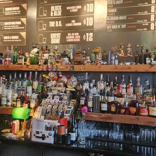 a bar filled with bottles of alcohol