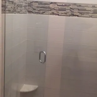 Doors Bottom Hinge Bolted To Floor (Not The Wall). ~0.125" Door To Fixed Panel Gap. Brilliant!!